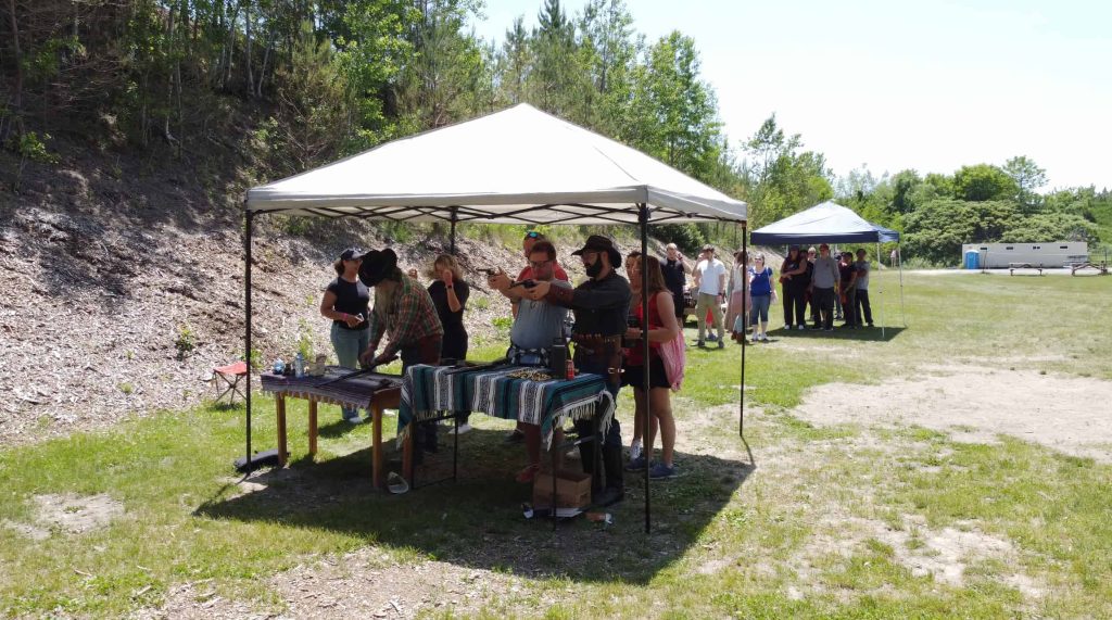 cowboy action table with pistols